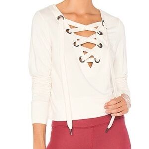 Alo Yoga Ideal Lace-Up Long-Sleeve Athletic Pullover Knit Top in Ecru White